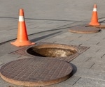 Enhanced Road Manhole Cover Detection Using MGB-YOLO: A Deep Learning Approach