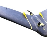 Control and Motion Planning of Fixed-wing UAVs Through Reinforcement Learning
