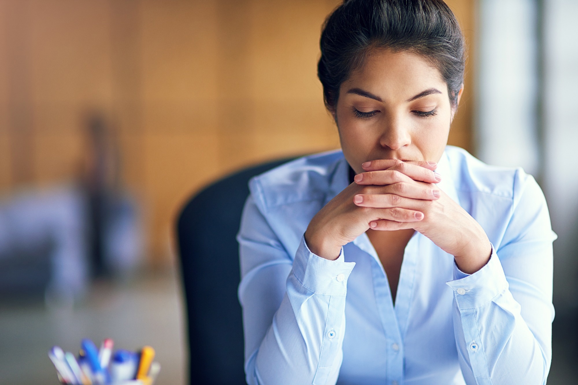 Stressed woman at work.