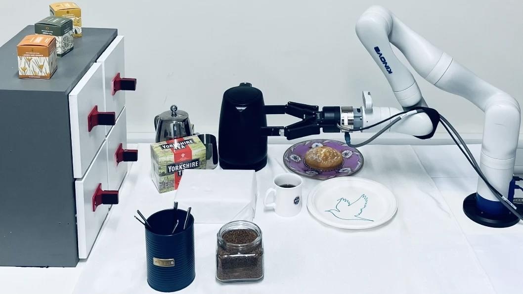 Kinova Gen3 robot having prepared the coffee and decorated a plate