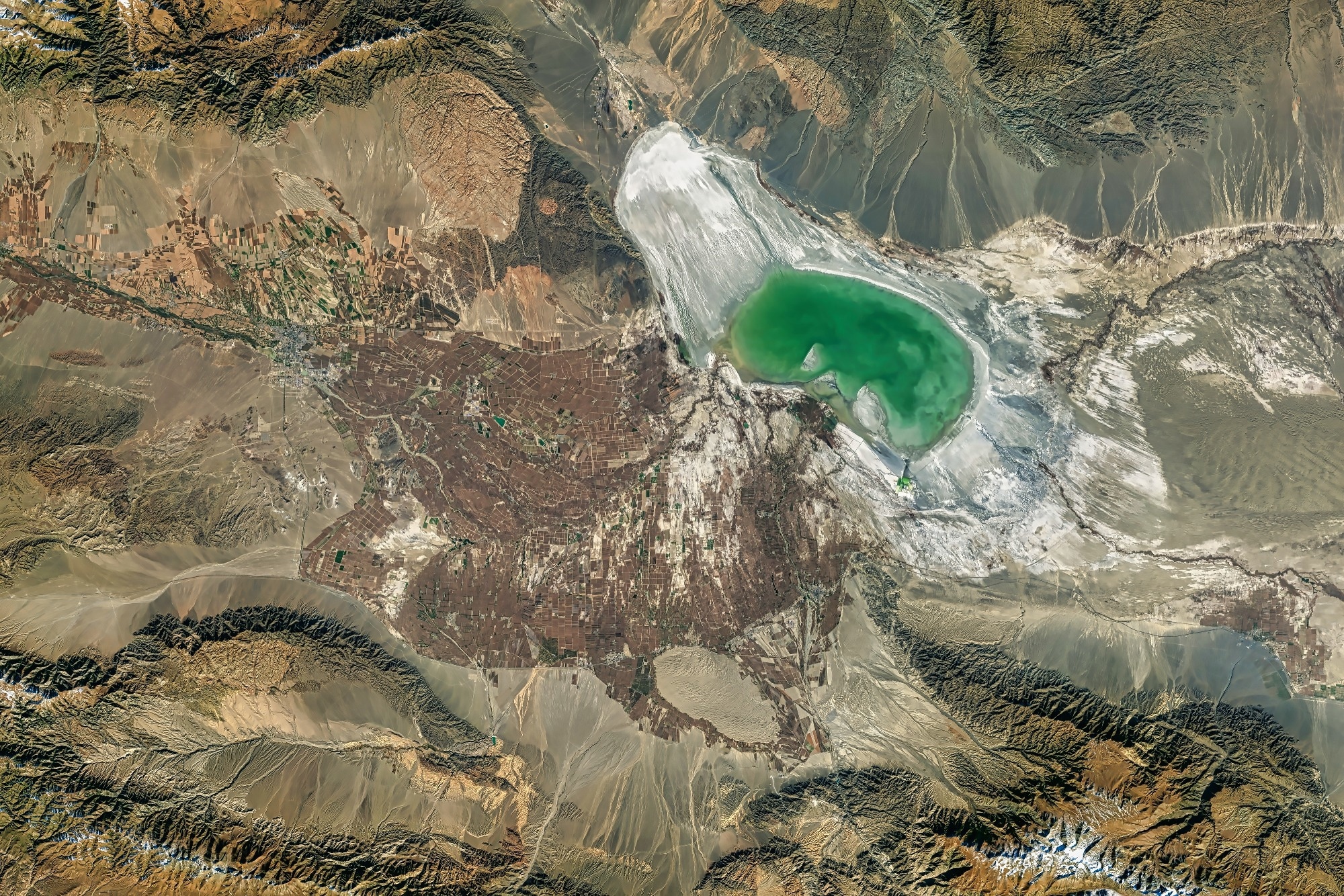 Shrinking Lake Ebinur. Declining water levels in this saline lake in northwestern China have exposed the playa to producing dust storms. Image Credit: BEST-BACKGROUNDS / Shutterstock